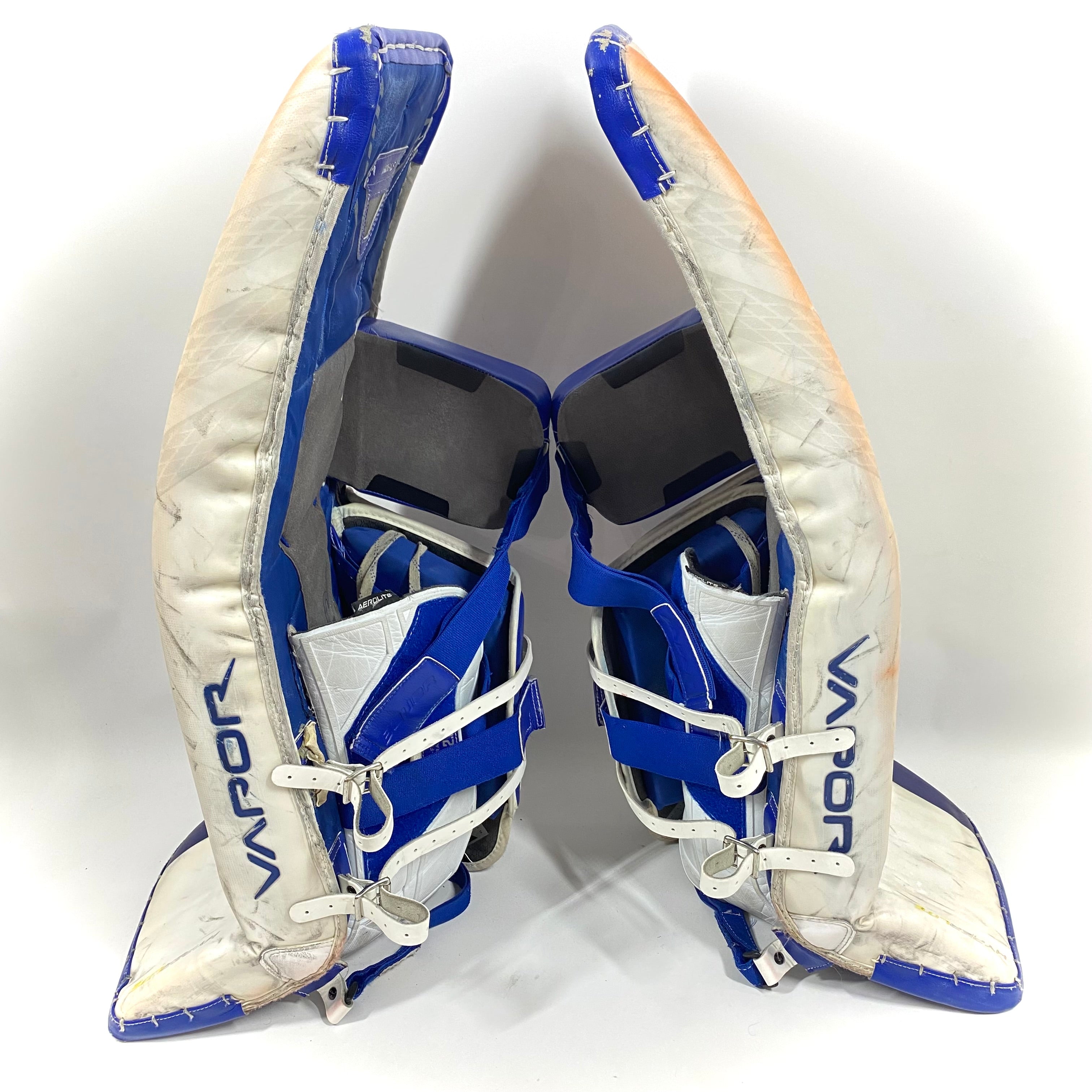 Bauer Vapor Hyperlite - Jambières de gardien Pro Stock d'occasion (blanc/bleu/jaune)